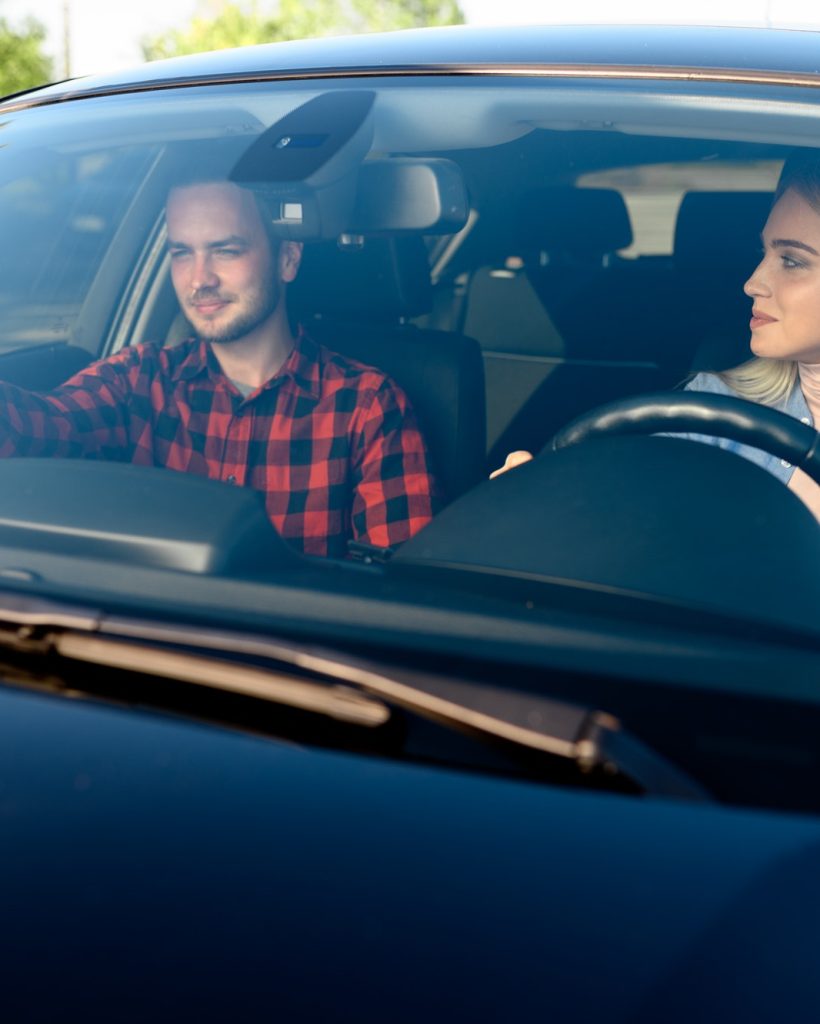 lady-and-male-instructor-in-car-driving-school.jpg